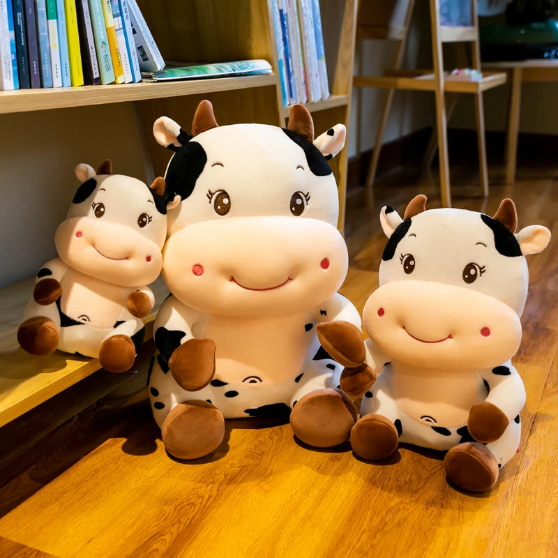 Sitzende Milchkühe Plüschfigur, 10-14" | 25-35 cm